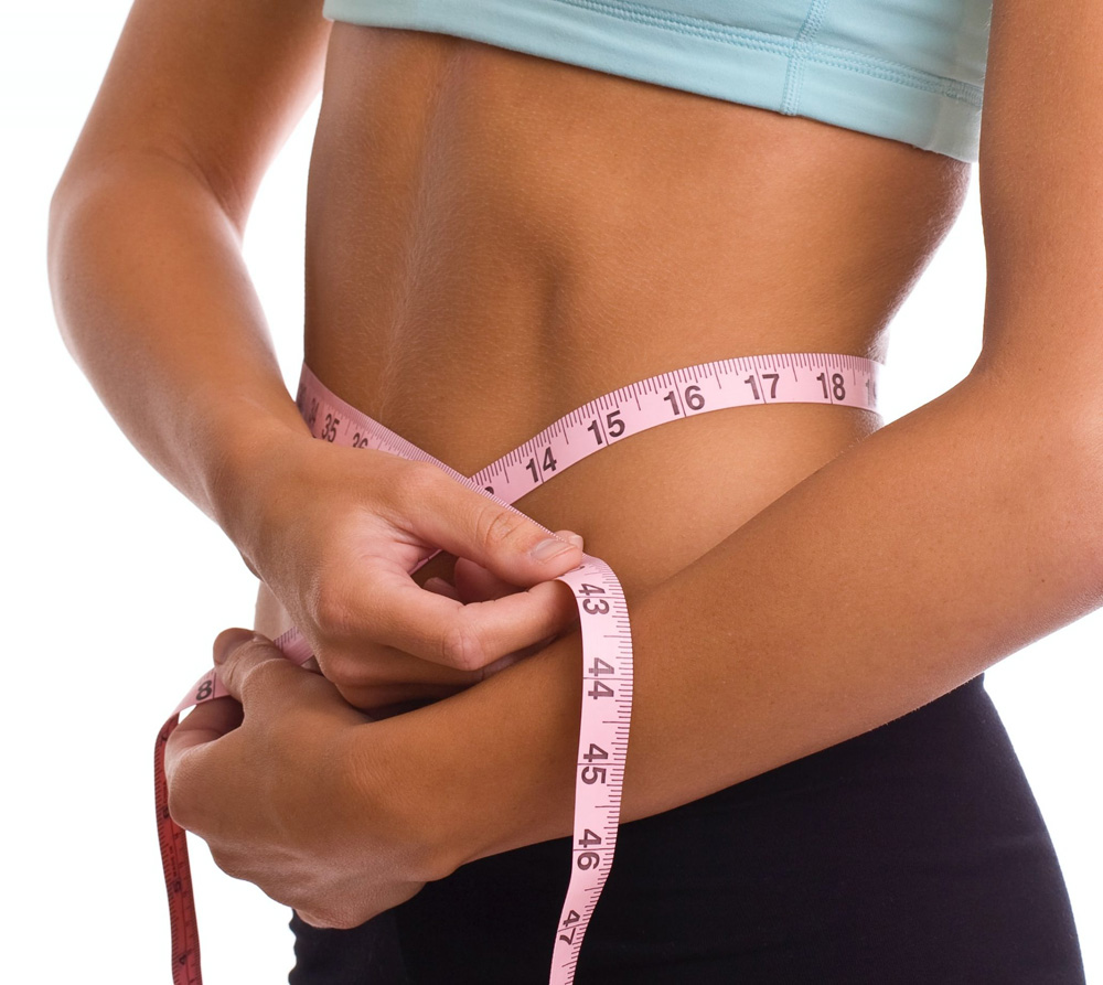 Weight Loss Injections treatment at Youth Skin Rx, showcasing woman with measuring tape indicating progress.